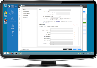 Desktop monitor showing custom QuickBooks data sync application built by Pell Software for Windows 10